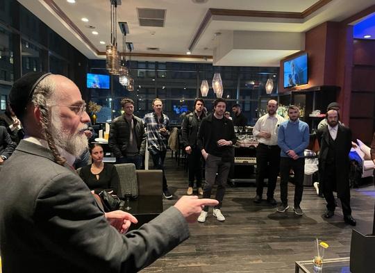 A fireside conversation with a founder in front of a curated room